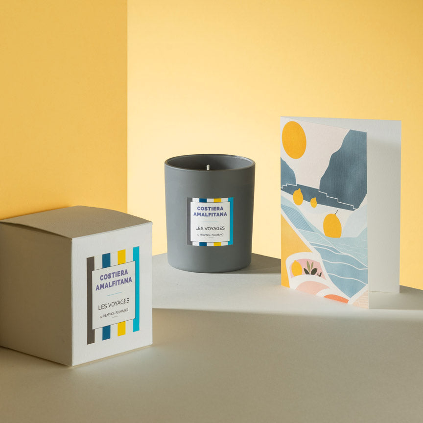 Costiera Amalfitana scented candle gift set by Heating & Plumbing London, featuring a luxury candle and illustrated fine art Amalfi Coast greeting card.