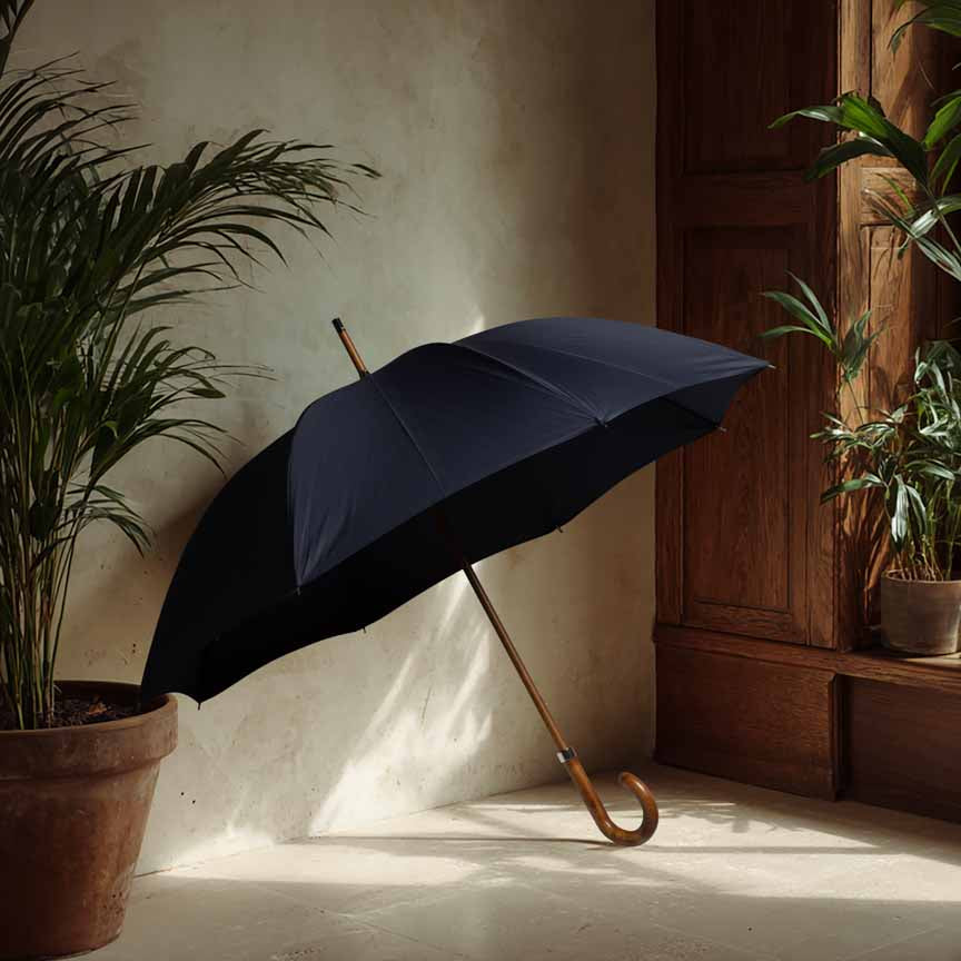 British walking umbrella with marine blue canopy, featuring handcrafted beech and maple wood handle.