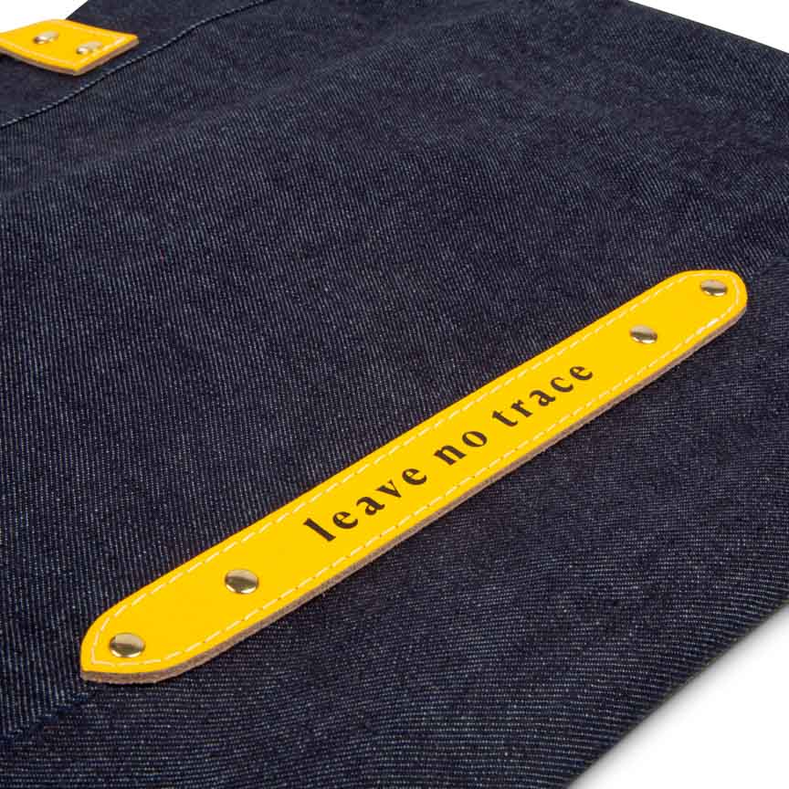 yellow leather strap on denim bag for picnics
