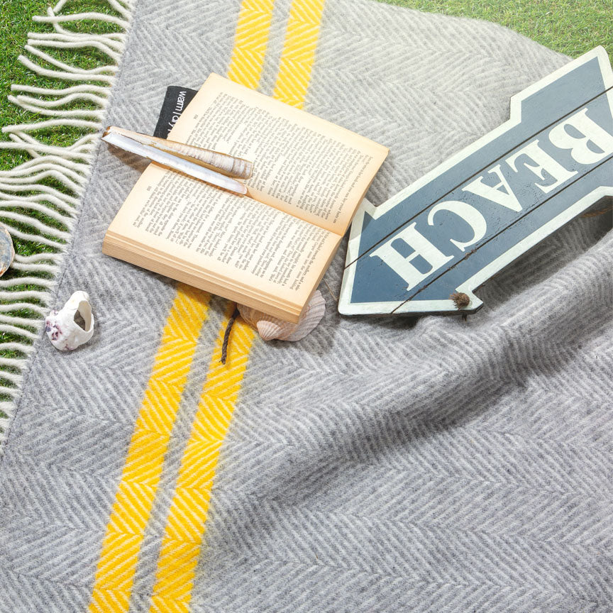 grey and yellow picnic blanket with waterproof backing