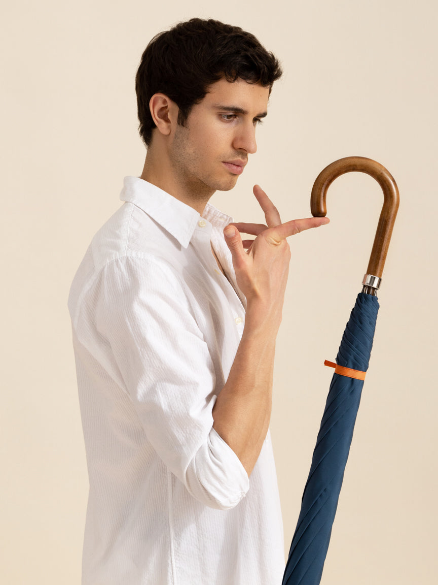 male model holding a British umbrella