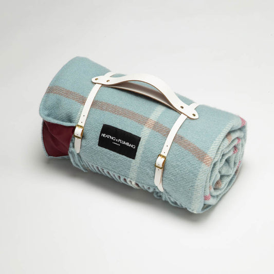 Duck egg check picnic throw blanket with wine colour waterproof backing and white leather strap. 