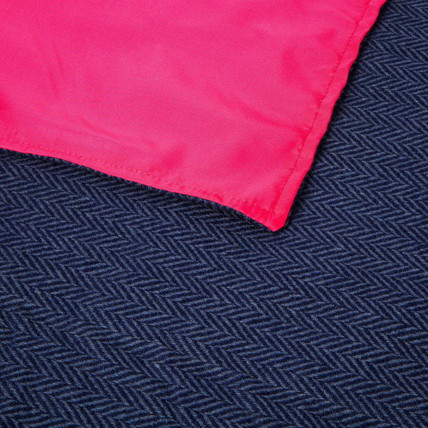 blue throw with waterproof backing in pink