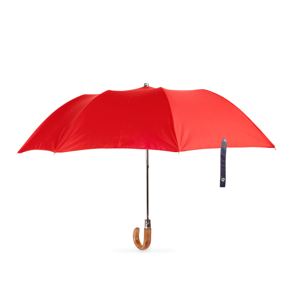 small folding British umbrella in stylish red
