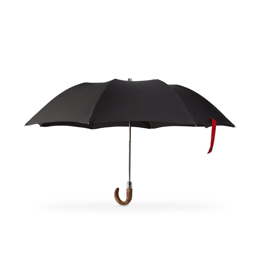 small folding British made umbrella with wooden handle